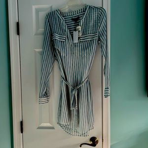 I bought this beautiful dress from Nordstrom. It’s light blue and white striped